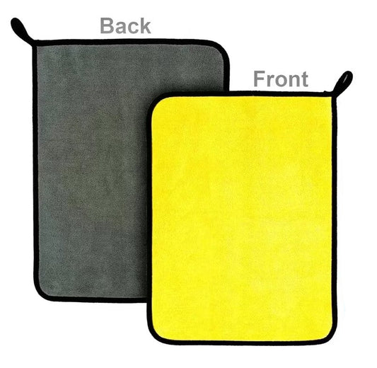 Yellow towel on the front and gray towel on the back with labels.
