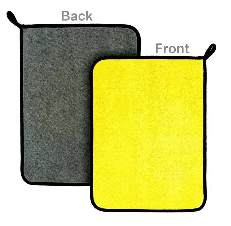 Yellow towel on the front and gray towel on the back with labels.