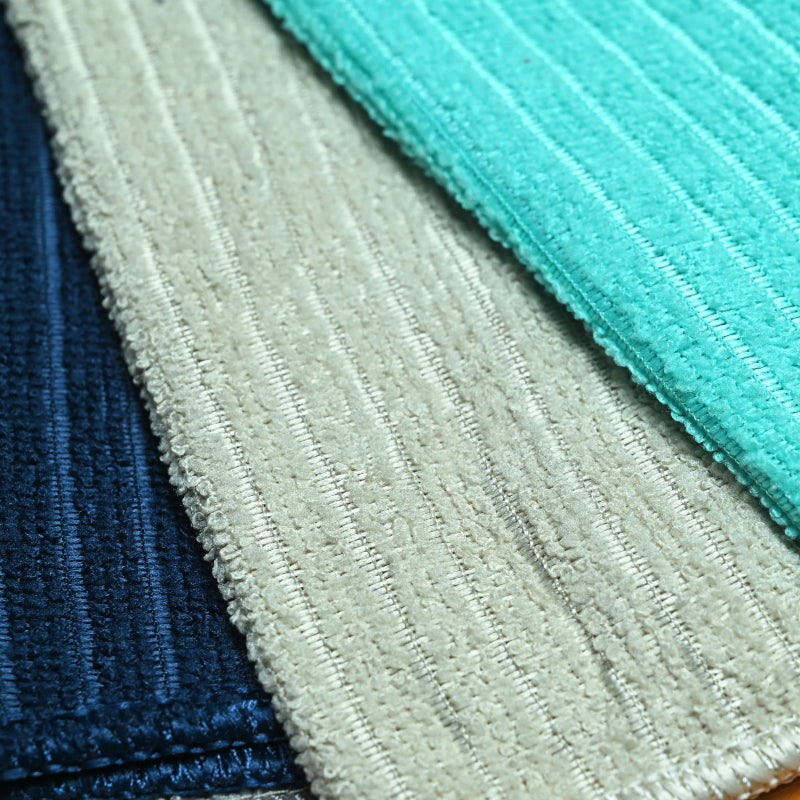 Close-up of textured fabric samples in various colors.