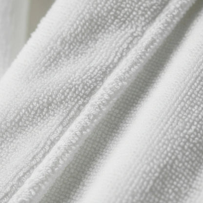 Close-up of textured white bath robe